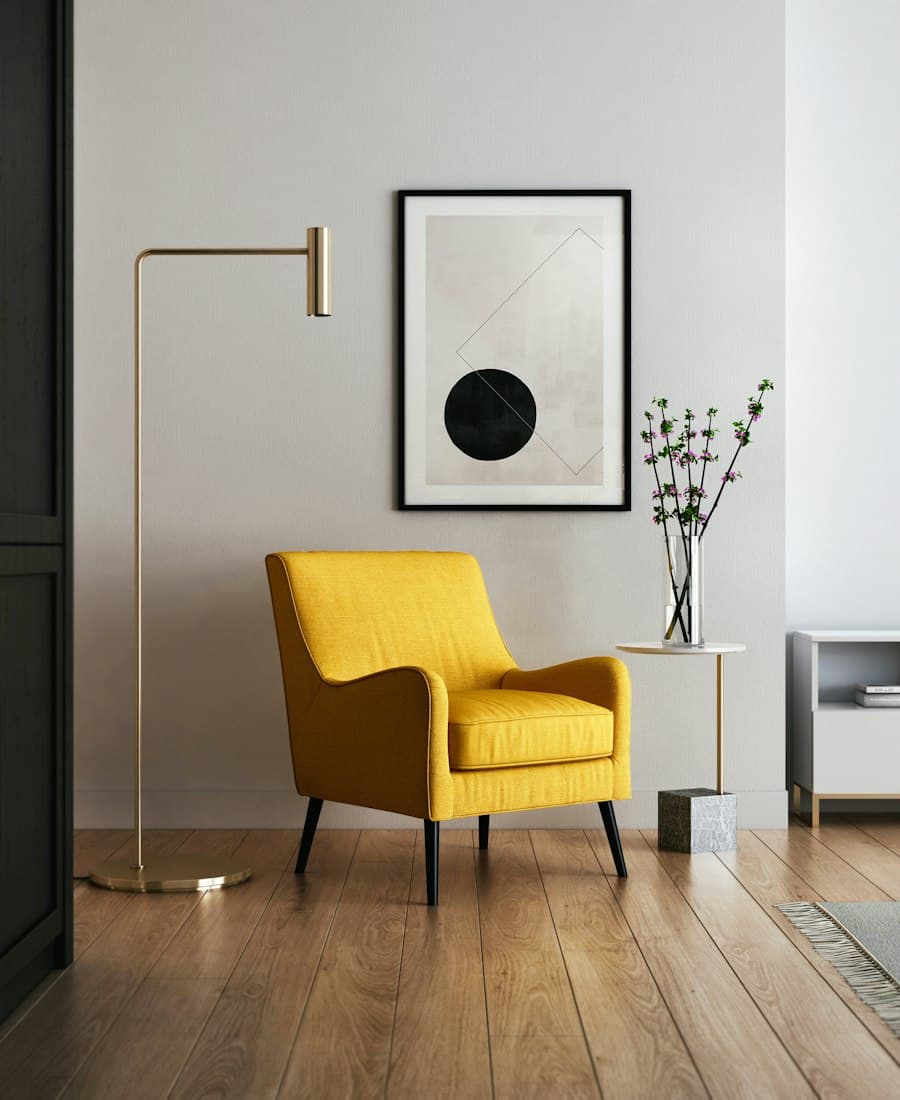 Yellow armchair and floor lamp against a white wall